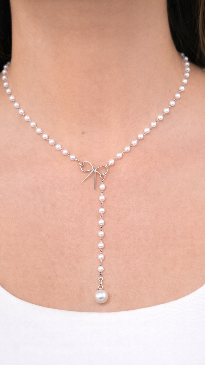 The Everly Pearl Bow Lariat Necklace